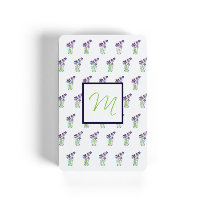 flowers with cup motif image adorns playing cards