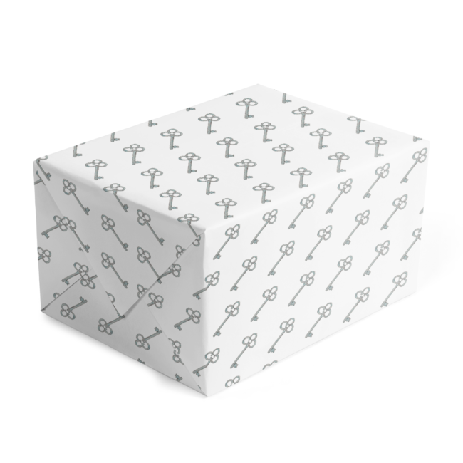 classic gift wrap with silver key image printed on white paper.