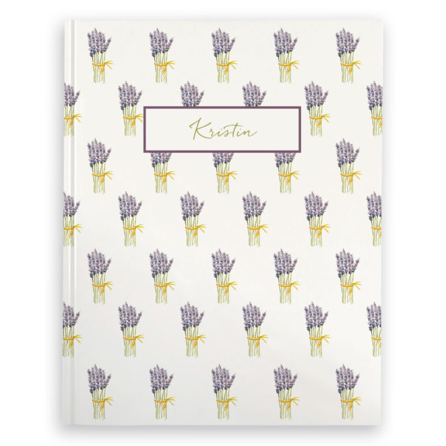 lavender image adorns a journal with blank pages.