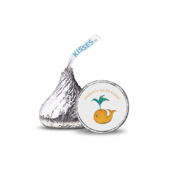 whale image printed on a candy sticker that fits on the bottom of a Hershey's kiss.