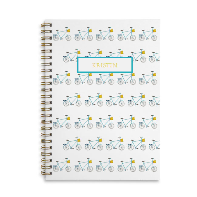 Personalized spiral bound notebook with a bike image.