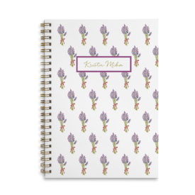 lavender spiral bound notebook with blank pages.