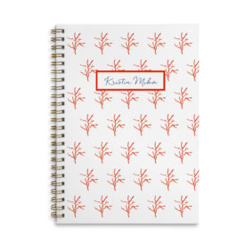 Red Coral Spiral Notebook with blank pages.
